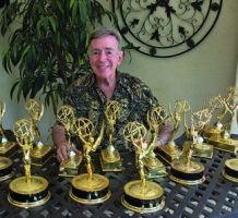 An armful of Emmy awards