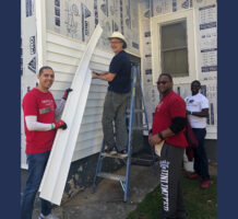 Volunteers perform needed home repairs